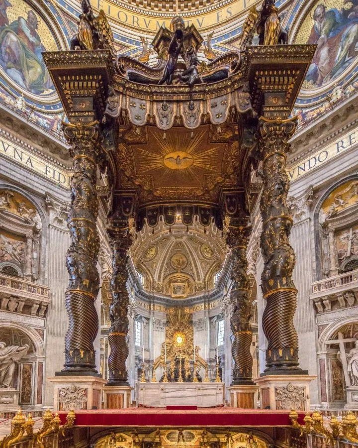 Baldachin and ornate interior of Saint Peter's Basilica by Andreas Düren
