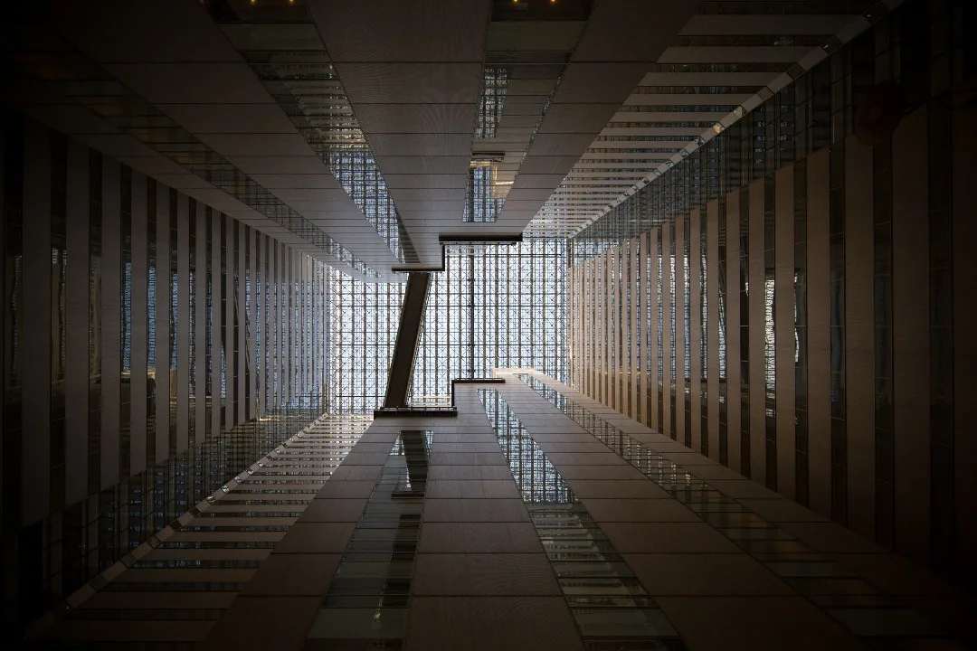 Symmetrical interior of a modern Tokyo skyscraper by Andreas Düren